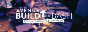 Banner announcing Avenue Build Up Bash &mdash; 35th anniversary celebration, with a dimly lit banquet table in the background.